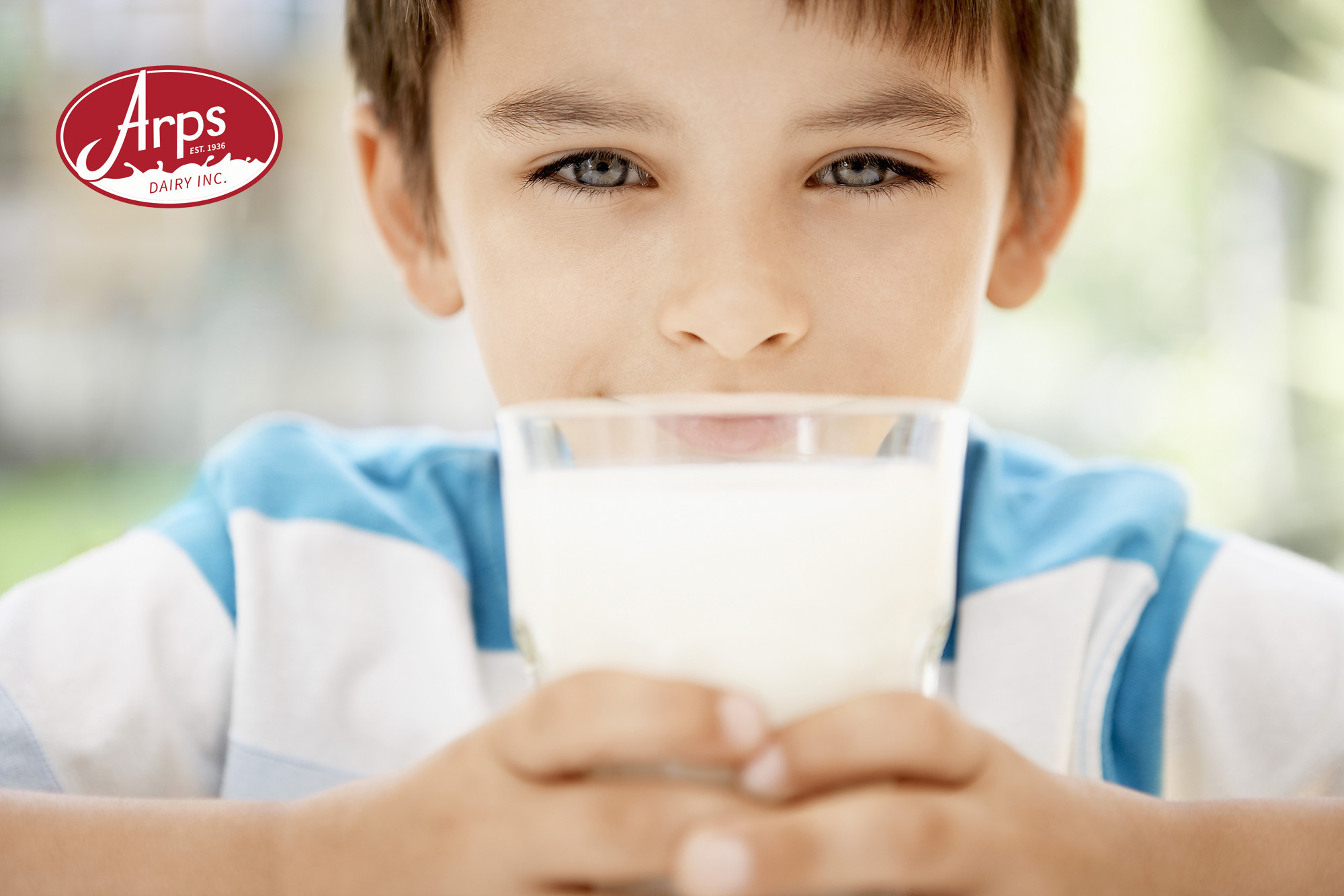 Arps Dairy - Boy Drinking Milk